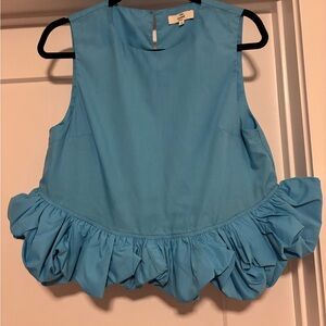 Sky Blue Ruffle Hem Sleeveless Blouse
